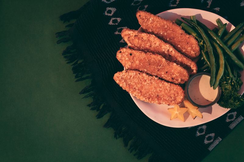 Sauced Tenders — Wing Snob tossed in buffalo sauce